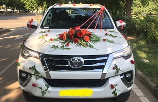 fortuner for rent near me, toyota fortuner for hire in bangalore, fortuner rent per month, fortuner car rental in bangalore